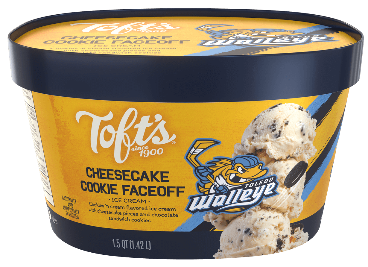 Toft's Cheesecake Cookie Faceoff ice cream tub featuring the Toledo Walleye logo, with cookies 'n cream flavored ice cream, cheesecake pieces, and chocolate sandwich cookies on the packaging.