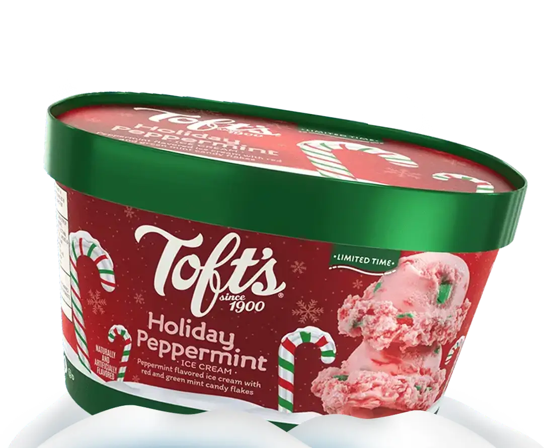 Carton of Toft Holiday peppermint ice Cream in a cute snowbank